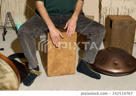 Comfortable living space with musician focusing on percussion instruments Comfortable living space with musician focusing on percussion instruments 142514767