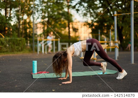 Sunset exercise with focus on progressive muscle overload Sunset exercise with focus on progressive muscle overload 142514870