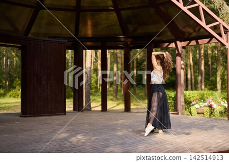 Focused caucasian dancer preparing for audition on stage 142514913