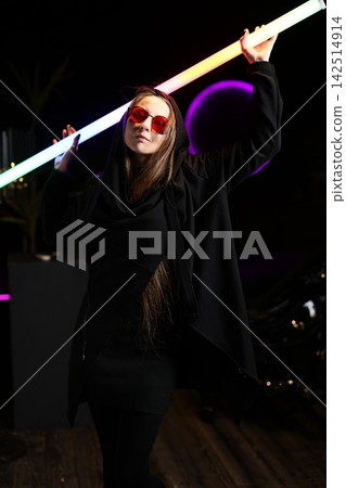 Fashionable female figure with colorful lighting effects Fashionable female figure with colorful lighting effects 142514914