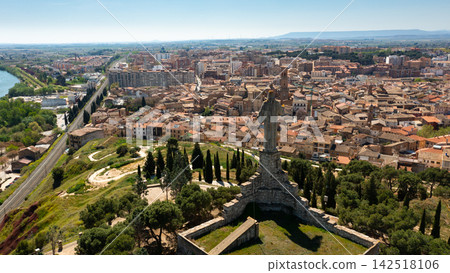 Aerial cityscape of Tudela with view of large Jesus statue Aerial cityscape of Tudela with view of large Jesus statue 142518106