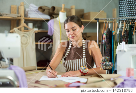Female seamstress drawing sketches Female seamstress drawing sketches 142518793