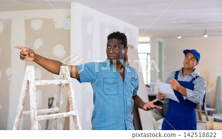 Owner of apartment expresses dissatisfaction with the work performed by foreman Owner of apartment expresses dissatisfaction with the work performed by foreman 142518822