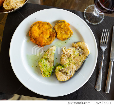 Fried swordfish fillet served with eggplant Fried swordfish fillet served with eggplant 142518825