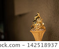 Sparkling gold leaf soft serve ice cream 142518937