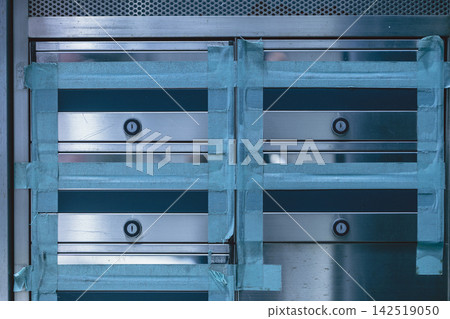 A sealed-off mailbox and blue masking tape. A sealed-off mailbox and blue masking tape. 142519050