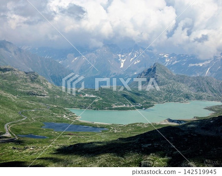Lago Bianco at the Bernina Pass, a World Heritage Site, and the majestic Alpine scenery (Switzerland) Lago Bianco at the Bernina Pass, a World Heritage Site, and the majestic Alpine scenery (Switzerland) 142519945