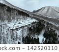 [Aerial view] Winter view of Ogihara Observatory and snowy mountain road / Shikaoi Town, Hokkaido 142520110