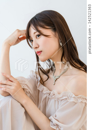A Japanese woman adorned with dazzling jewelry. An elegant portrait that enhances her beauty. A Japanese woman adorned with dazzling jewelry. An elegant portrait that enhances her beauty. 142521363