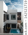 Modern white tourist accommodation with contemporary architectural design 142521719