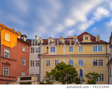 Classic European houses with tiled roofs and dormer windows. Classic European houses with tiled roofs and dormer windows. 142522640