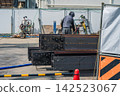 H-beams and gas cylinders at a construction site 142523067