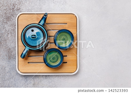 Asian tea ceremony set with teapot and cups Asian tea ceremony set with teapot and cups 142523393