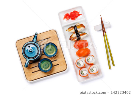 Sushi set with tea and small teapot Sushi set with tea and small teapot 142523402