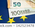 Euro banknote and coin, Europe money, economy finance exchange trade investment. 142523478