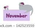 A cat in November with the words "November" written on it. 142523550