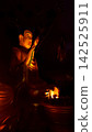 Two Sitting Buddha Statues and Flags at Chua Da Bao Pagoda in Nha Trang, Vietnam 142525911