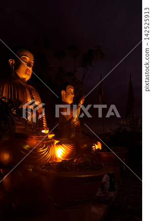 Two Sitting Buddha Statues and Flags at Chua Da Bao Pagoda in Nha Trang, Vietnam Two Sitting Buddha Statues and Flags at Chua Da Bao Pagoda in Nha Trang, Vietnam 142525913