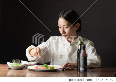 Female chef Female chef 142526079