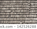 Weathered Wooden Shingle Roof with Traditional Rustic Wood Roofing Texture for Heritage Architecture and Interior Design 142526288