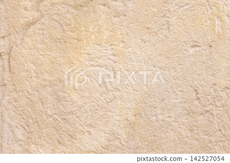 Beige weathered sandstone wall surface with natural rough grain texture and cracks. Abstract background of ancient stone architecture Beige weathered sandstone wall surface with natural rough grain texture and cracks. Abstract background of ancient stone architecture 142527054
