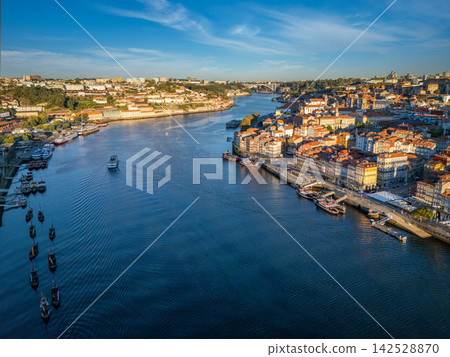 Drone View of Douro River with tourist boat and Ribeira Drone View of Douro River with tourist boat and Ribeira 142528870