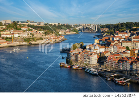 Porto Ribeira and Douro River view, Portugal, with tourist rabelo boats Porto Ribeira and Douro River view, Portugal, with tourist rabelo boats 142528874