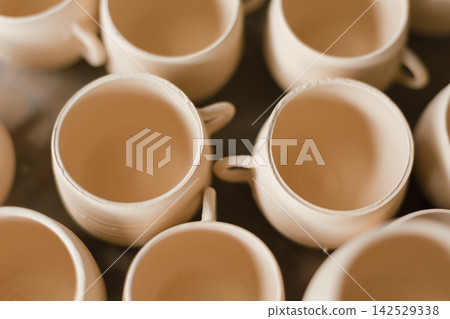 The process of creating pottery. The process of creating pottery. 142529338