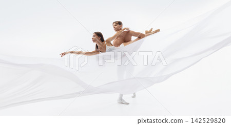 Horizontal ballet lift captures precision and trust between dance partners Horizontal ballet lift captures precision and trust between dance partners 142529820