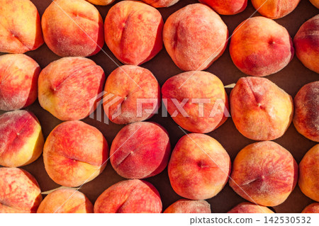 fresh peaches are stacked in rows fresh peaches are stacked in rows 142530532