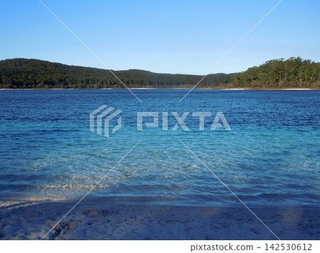 A clear blue lakeside A clear blue lakeside 142530612