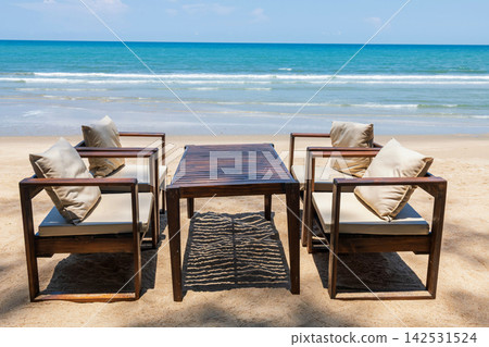 cafe table and chairs on Baan Krood sandy beach, Bang Saphan cafe table and chairs on Baan Krood sandy beach, Bang Saphan 142531524