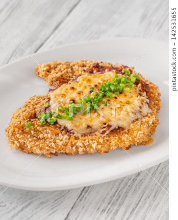 Classic Chicken Parmesan with crispy breading tomato sauce melted mozzarella and fresh chives Classic Chicken Parmesan with crispy breading tomato sauce melted mozzarella and fresh chives 142531655