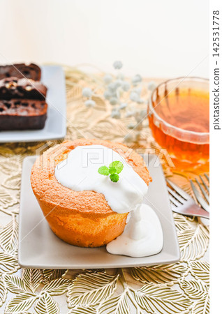 Freshly baked chiffon cake with whipped cream. Freshly baked chiffon cake with whipped cream. 142531778