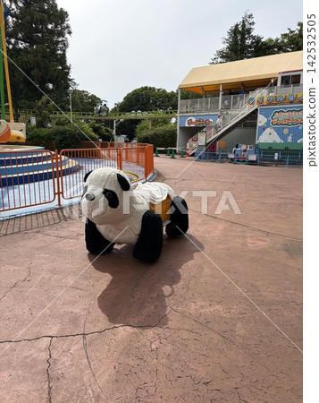 A retro panda ride at an amusement park A retro panda ride at an amusement park 142532505