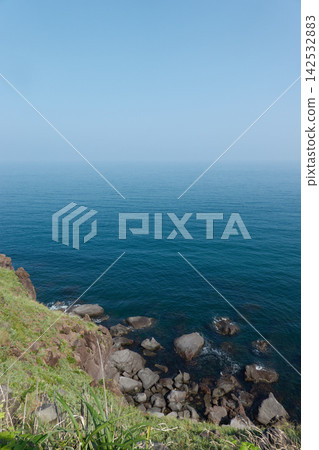 Misaki Park, Yuza Town: A view of the Sea of Japan's coastline from a cliff. Misaki Park, Yuza Town: A view of the Sea of Japan's coastline from a cliff. 142532883