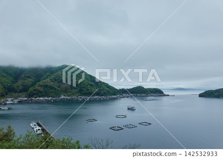 Aerial view of boathouses in Ine Bay Aerial view of boathouses in Ine Bay 142532933