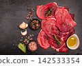 Raw organic steak with ingredients for cooking 142533354
