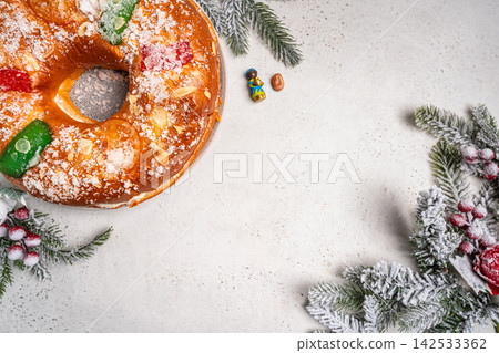 Roscon de reyes is a traditional Spanish Christmas pastry cake Roscon de reyes is a traditional Spanish Christmas pastry cake 142533362