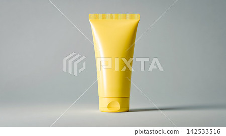 Yellow cosmetic tube mockup on gray background. Blank plastic container for sun protection, vitamin c cream or hand lotion. Minimalist skincare packaging for summer season and travel kit. SPF cream. 142533516