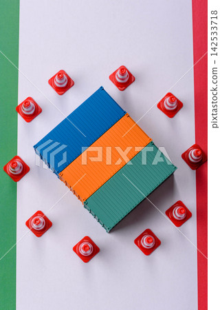 The cargo container ban on the Italian flag as a conceptual backdrop. Cargo container embargo The cargo container ban on the Italian flag as a conceptual backdrop. Cargo container embargo 142533718
