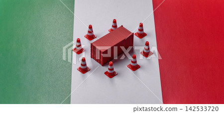 The cargo container ban on the Italian flag as a conceptual backdrop. Cargo container embargo The cargo container ban on the Italian flag as a conceptual backdrop. Cargo container embargo 142533720