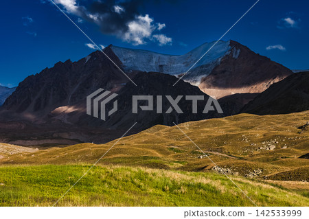 Tien Shan mountain's seasonal panoramic view at dramatic scenery Tien Shan mountain's seasonal panoramic view at dramatic scenery 142533999