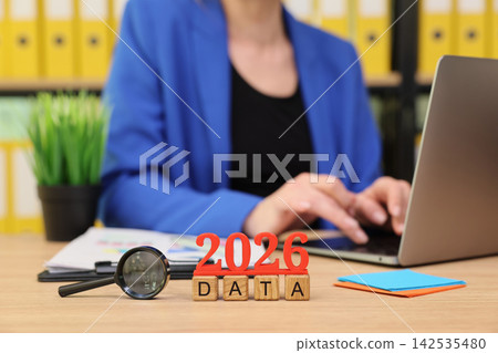Working with data and planning for the future in a modern office setting Working with data and planning for the future in a modern office setting 142535480