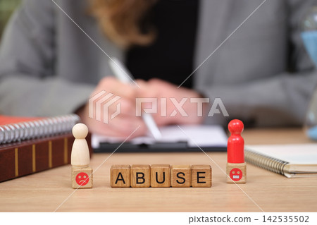 Exploring themes of abuse through symbolism and personal reflections in a creative workspace Exploring themes of abuse through symbolism and personal reflections in a creative workspace 142535502