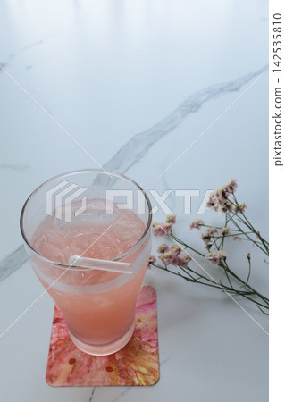 Cold juice with ice Cold juice with ice 142535810