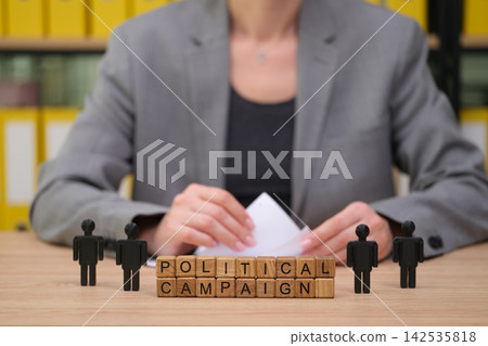 Engaging in a political campaign with strategy and purpose at an office setting Engaging in a political campaign with strategy and purpose at an office setting 142535818