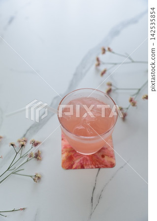 Cold juice with ice Cold juice with ice 142535854