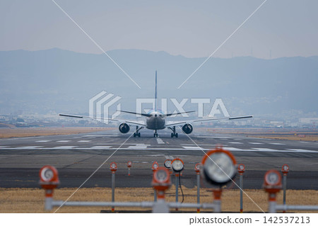 airplane taking off airplane taking off 142537213