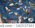 Denim and lots of pin badges 142537301